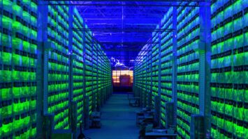 less than p greater than illuminated mining rigs operate inside racks at the cryptouniverse cryptocurrency mining farm in nadvoitsy russia less than p greater than1